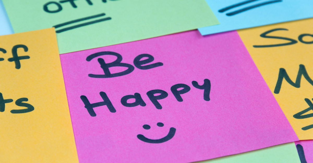 stick-on colored cards with the words be happy