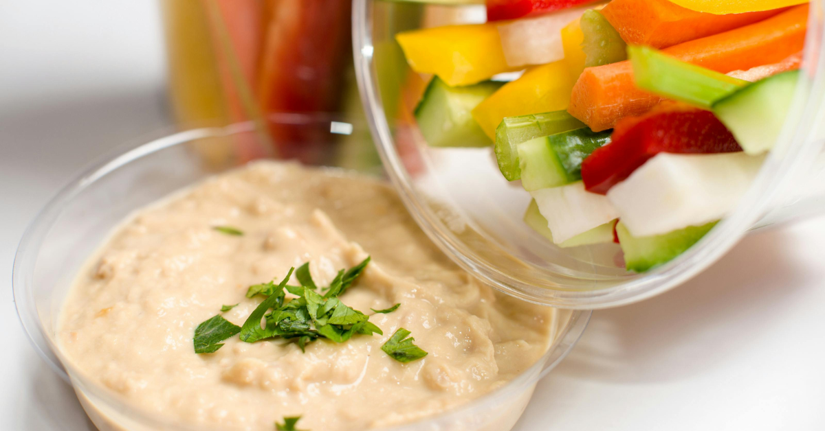 colorful vegetables with natural hummus as a snack
