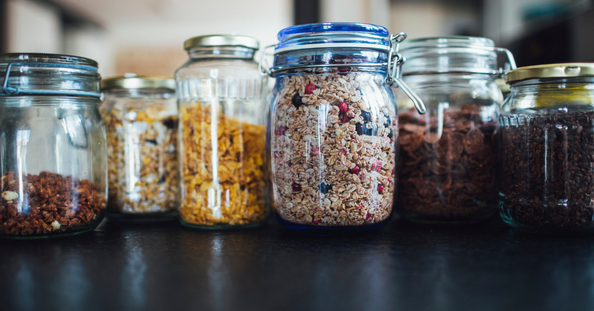 jars full of prepared snacks such as oatmeal, nuts, coconut flakes